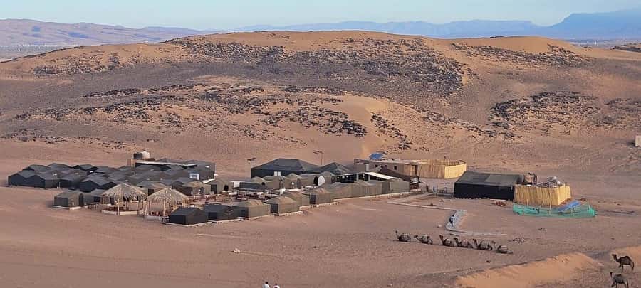 2-Day Luxury Excursion from Marrakech to the Zagora Desert - Luxury camp night: dinner, music, and sleeping under desert stars