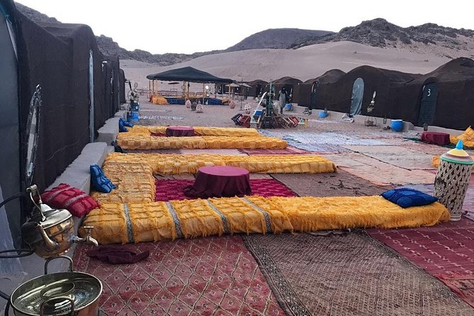 2-Day Zagora Tour from Marrakech Including the Atlas Mountains, Camel Trek and Desert Camp - Berber camp night in the dunes: dinner, music, and sleeping expectations