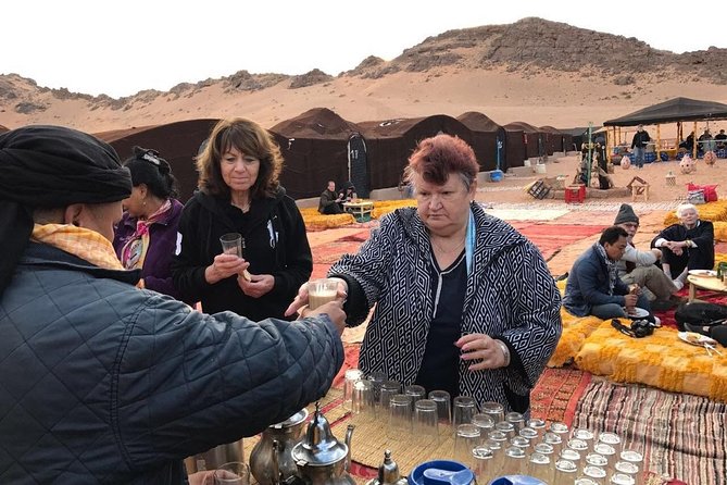 2-Day Zagora Tour from Marrakech Including the Atlas Mountains, Camel Trek and Desert Camp - Zagora desert arrival: sunset, dunes, and the camel trek moment