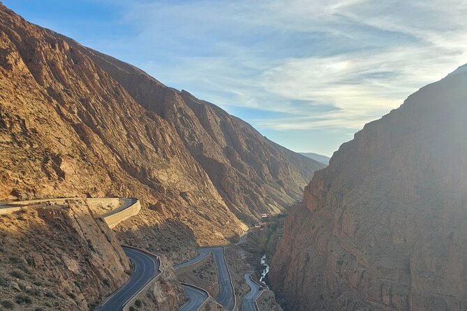 4 Days Desert Safari Tour from Marrakech to Merzouga - Day 4: Return to Marrakech via Ouarzazate, Todra and Dades, and the High Atlas pass