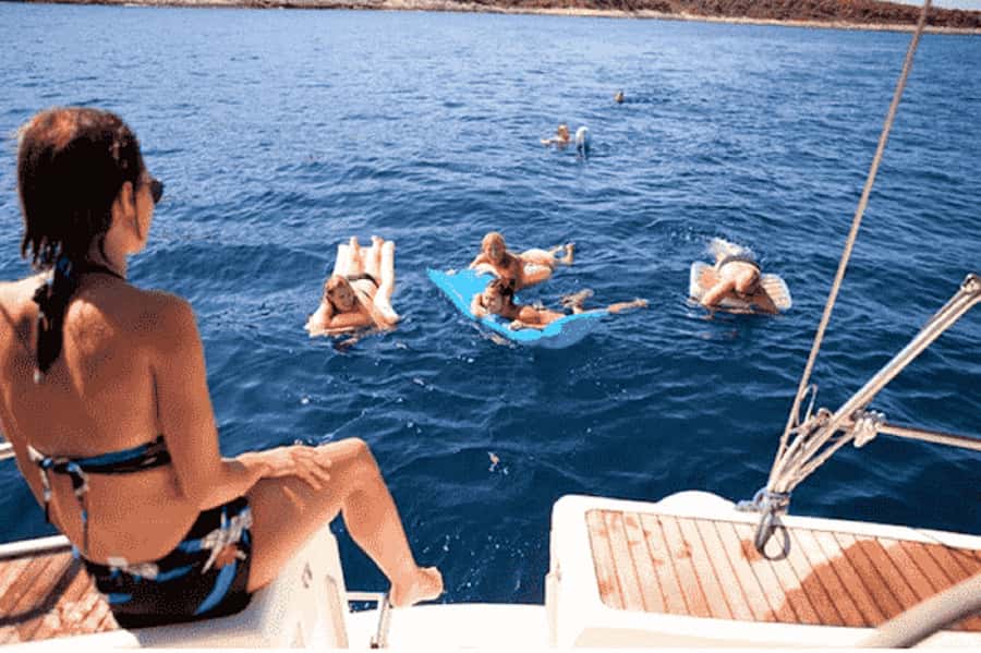 Agadir: Boat Trip with Fishing, Swimming, and BBQ Lunch - Coastal views from deck, without overpromising