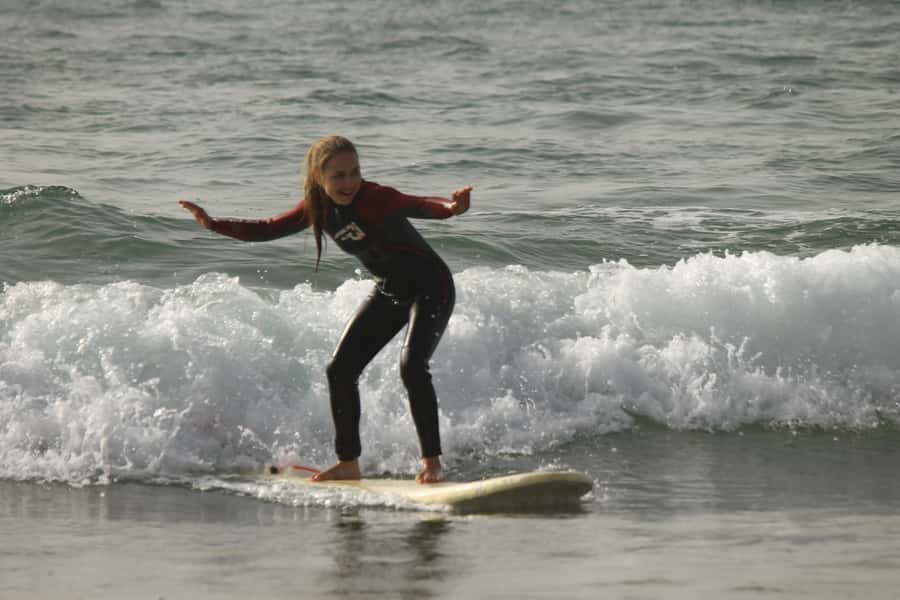 Agadir: Taghazout Beach Surf Lesson with Lunch and Transfer - The lesson structure, theory, warm-up, then coached waves