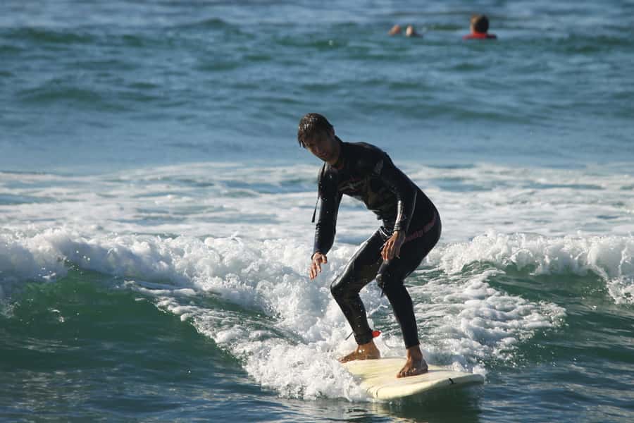 Agadir: Taghazout Beach Surf Lesson with Lunch and Transfer - Afternoon surf: more practice, and conditions that can change