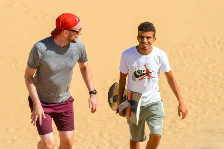 Agadir/Taghazout : Sandboarding & Sunset Camel Ride with BBQ - Plage Aghroud stop: quick photos, easy stretch