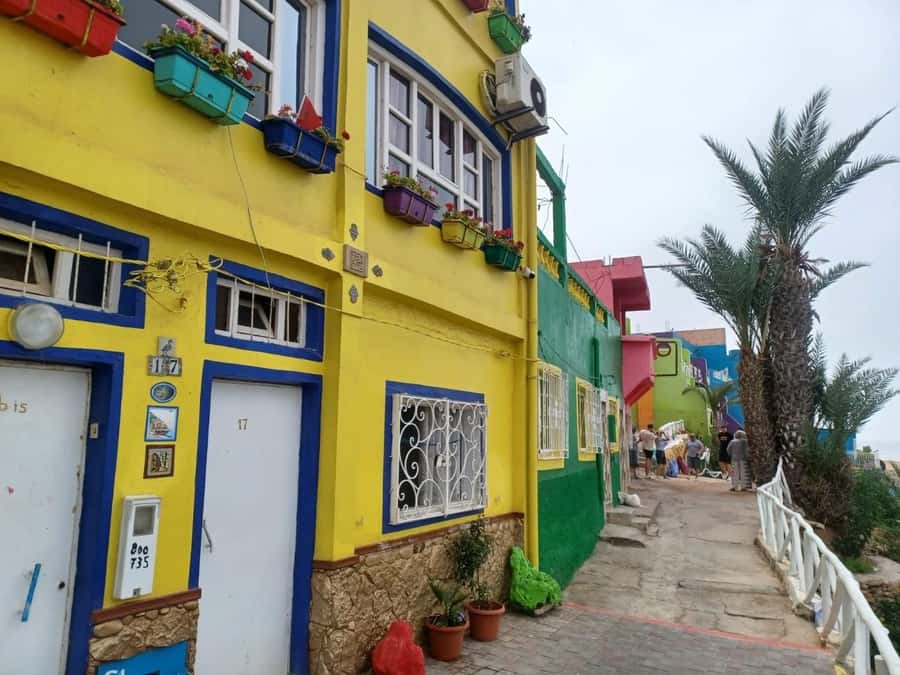 Agadir/Taghazout: Sandboarding & Visit of Canyons With Lunch - The Coastal Stops: Plage Aghroud and the Colorful Village Moment