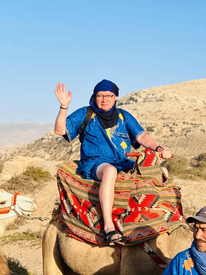 Agadir/Taghazout: Sunset Camel Ride with BBQ and Music Show - Tamri ranch welcome, traditional nomad clothing, and safety basics