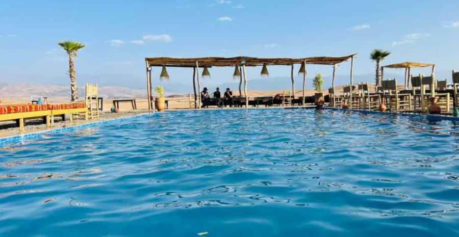Agafay Desert Day: Quad Bike, Lunch & Swim Adventure - Outdoor desert pool break: cooling off is the whole point