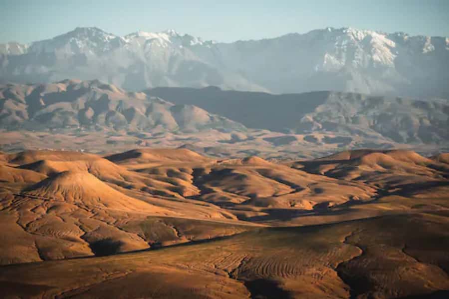 Agafay Desert: Magical Half-Day Lunch with Pool Swim - Lunch at the camp: Moroccan food, tea, and music