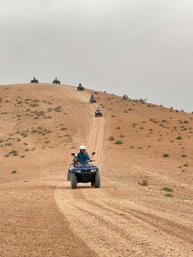 Agafay experience : Dinner with sun set camel or quad ride - Pickup from Marrakech, then the 1-hour camel or quad ride