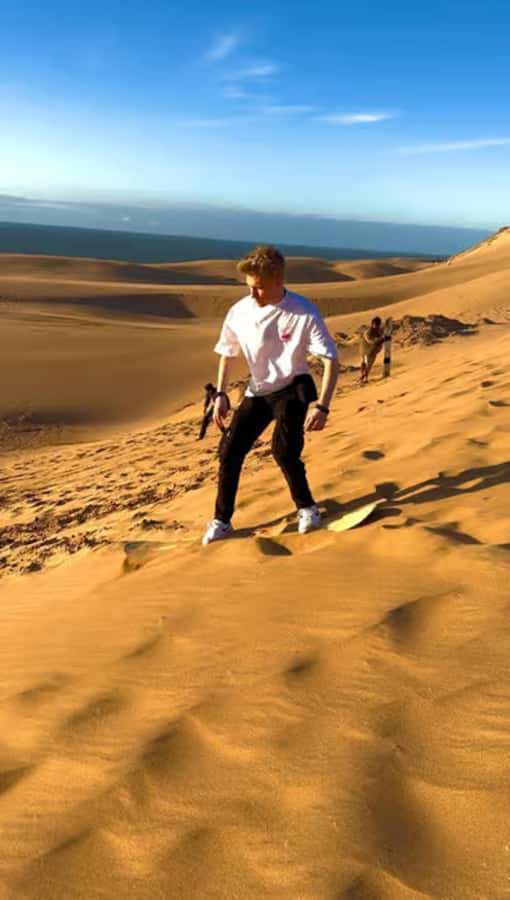 Best Agadir Desert Adventure: Quad Camel Sandboarding & BBQ - Timlalin Dunes: Sandboarding, Sunset Views, and First-Timer Confidence