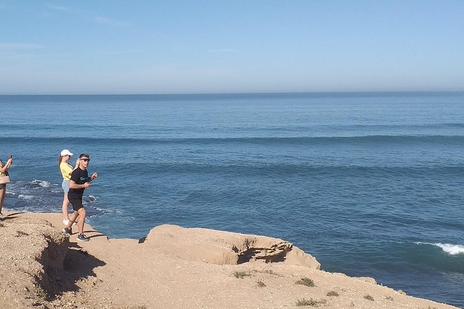 Desert and Wild Beach Day Trip with Meal - Fishermen’s cave and tea: the calm, coastal side of the trip
