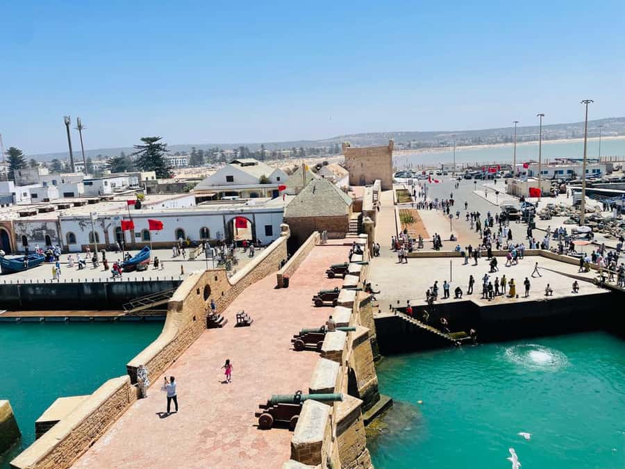 Essaouira: Sqala du Port, Citadel, Fish Market & Medina Tour - UNESCO Medina souks: whitewashed streets, blue shutters, and artisan rhythm