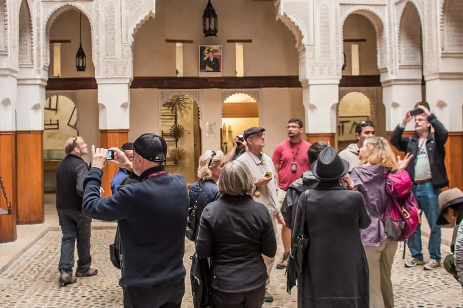 Fes: Attarine Madrasa, Museum, Tannery, Souk and Medina Tour - Bab Bou Jeloud: your shortcut into UNESCO Fes