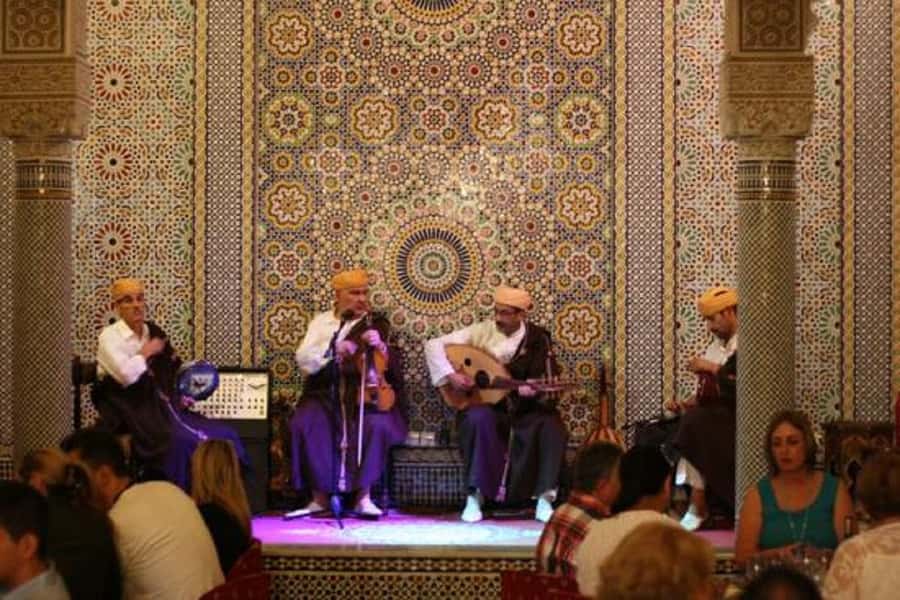 Fes : Unforgettable Dinner Show Experience with hotel pickup - The Moroccan Meal: Seven Salads, Tajines, Couscous, and Fruit Dessert
