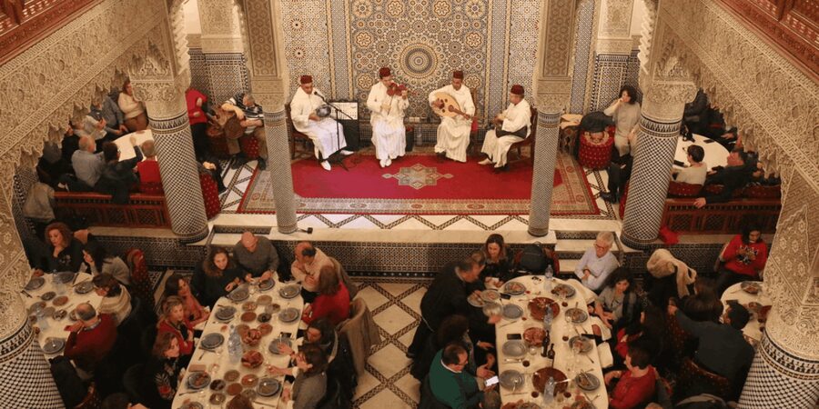 Fes : Unforgettable Dinner Show Experience with hotel pickup - Live Music First: Drummers, Violin, Oud, and Drums