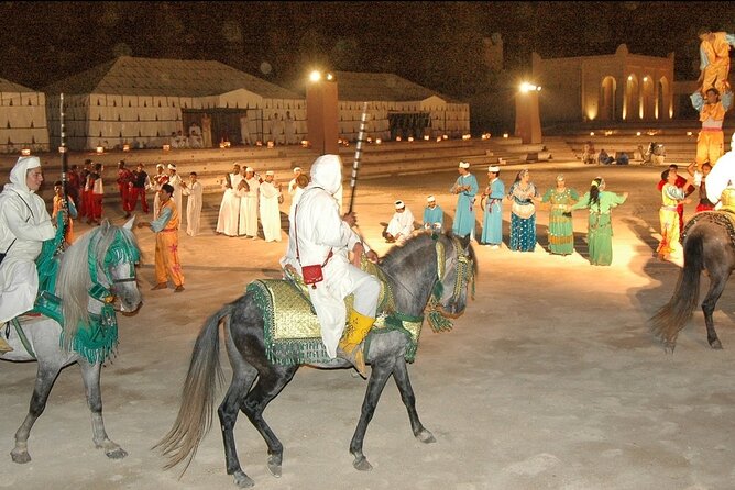 From Agadir Fantasia Folk Show & Moroccan Dinner With Transfer - What’s it like inside during dinner and the first show acts?