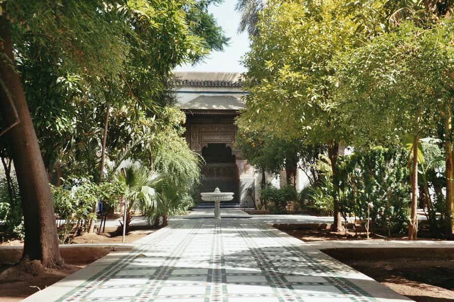 From Casablanca: Day Trip to Marrakech with Camel Ride - Koutoubia Mosque, Medina lanes, and Bahia Palace: the heart of the day