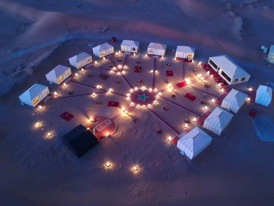 From Marrakech: 3-Day Marzouga Desert Tour with Camel Ride - Merzouga camp night: mint tea, sunset camel ride, and dinner by fire
