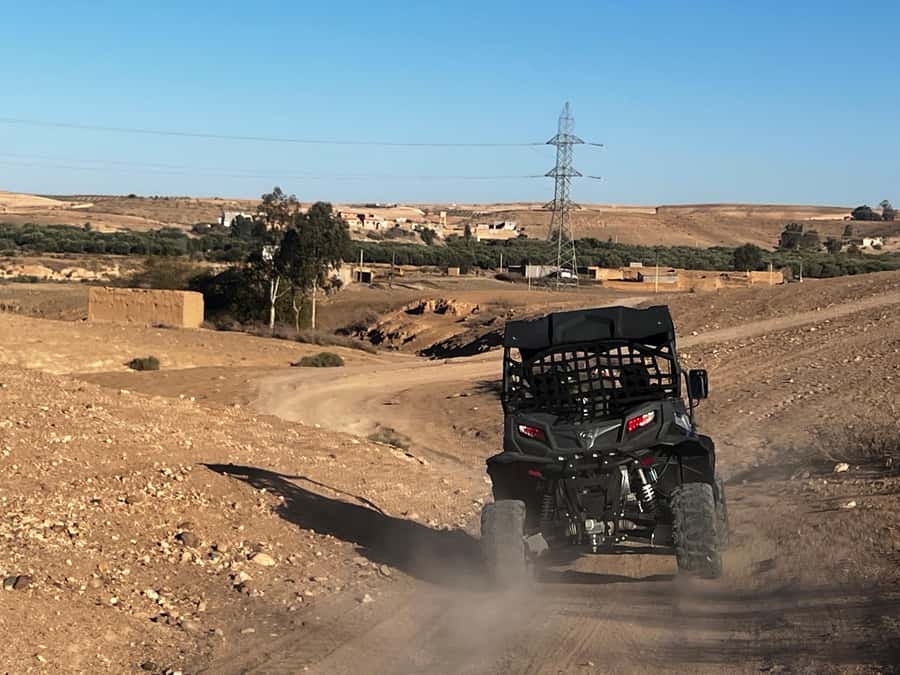 From Marrakech: Agafay Desert Buggy 1Hour & Dinner Show - The one-hour buggy ride, shared buggy layout, and photo stops