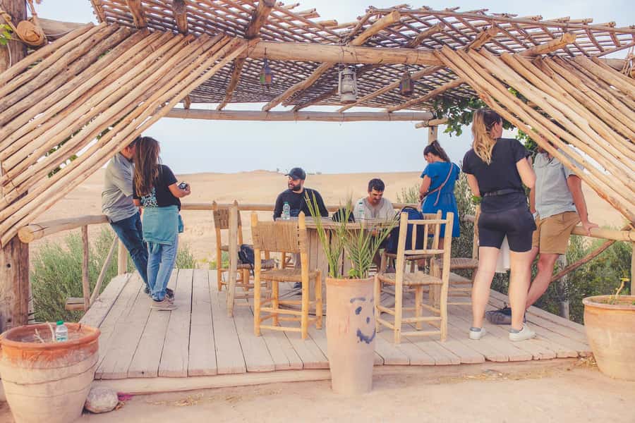 From Marrakech: Agafay Desert Camel Ride and Dinner and Show - Agafay Desert at dusk, close enough for a real evening plan