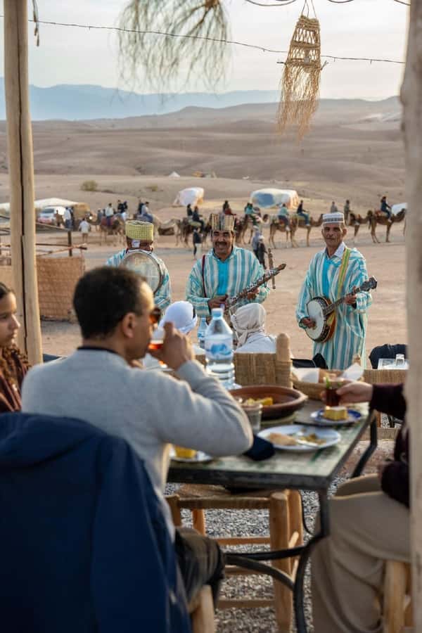From Marrakech: Agafay Desert Quad Biking with Dinner & Show - Berber tent dinner: tea, tajine, and campfire music