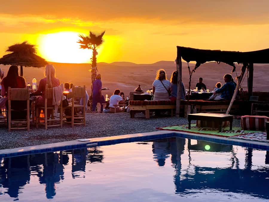 From Marrakech: Agafay Desert Sunset, Quad Biking, & Dinner - Pickup, cooperatives, and the drive into Agafay