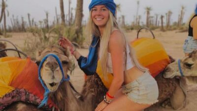Camel ride in the oasis palmeraie Grove