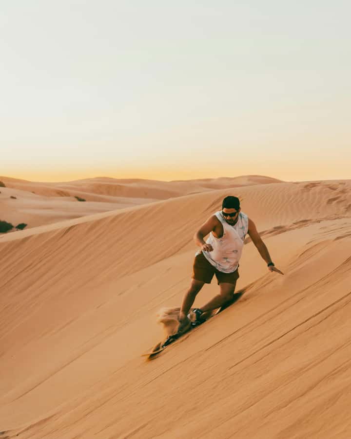 From Merzouga: Sunset Camel Ride & Sandboarding - Park, Then Get Picked Up With Camels