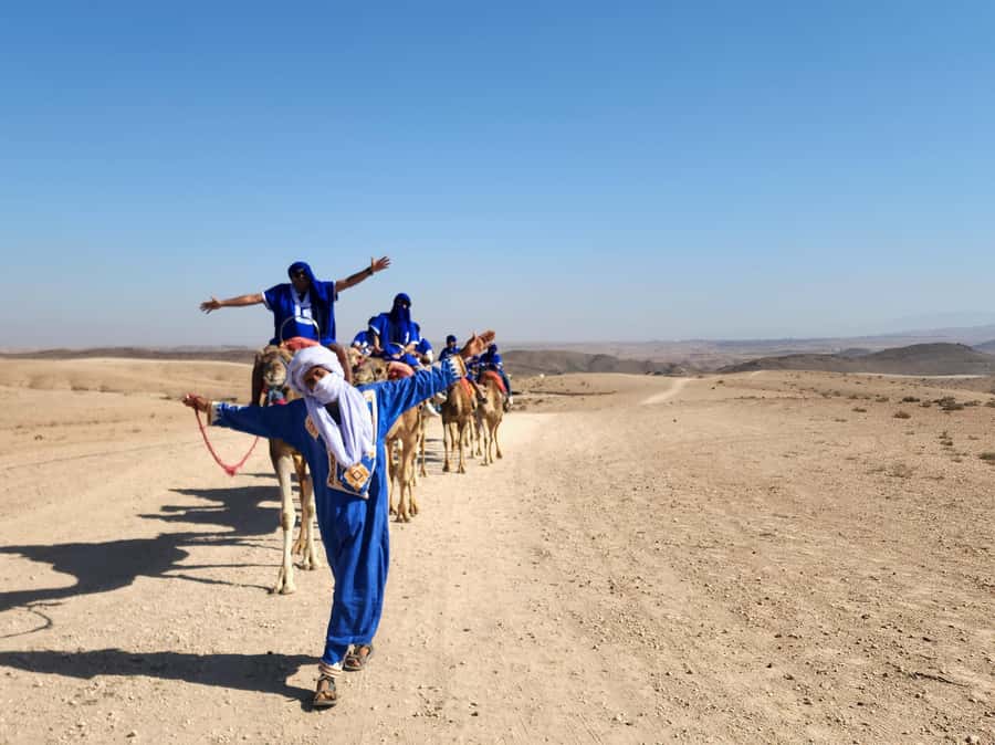 Marrakech: Agafay Camel Ride & Dinner with Fire Show Tour - Moroccan Dinner, Live Music, and How the Night Unfolds