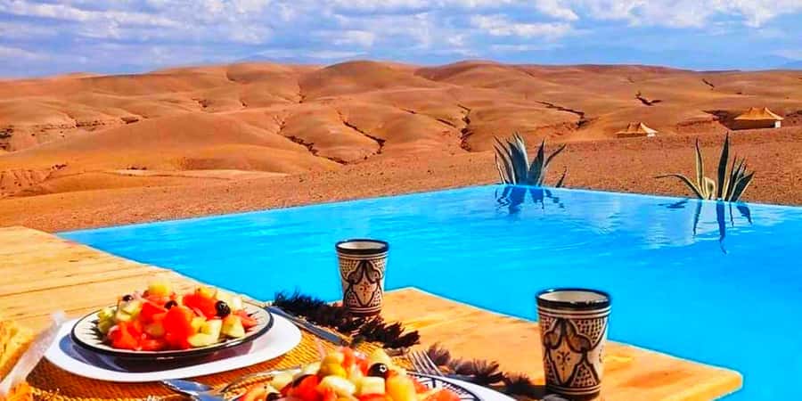 Marrakech: Agafay Desert Camp Lunch with Camel Ride and Pool - Moroccan Lunch at Agafay: Tagines, Couscous, and Vegetarian Options