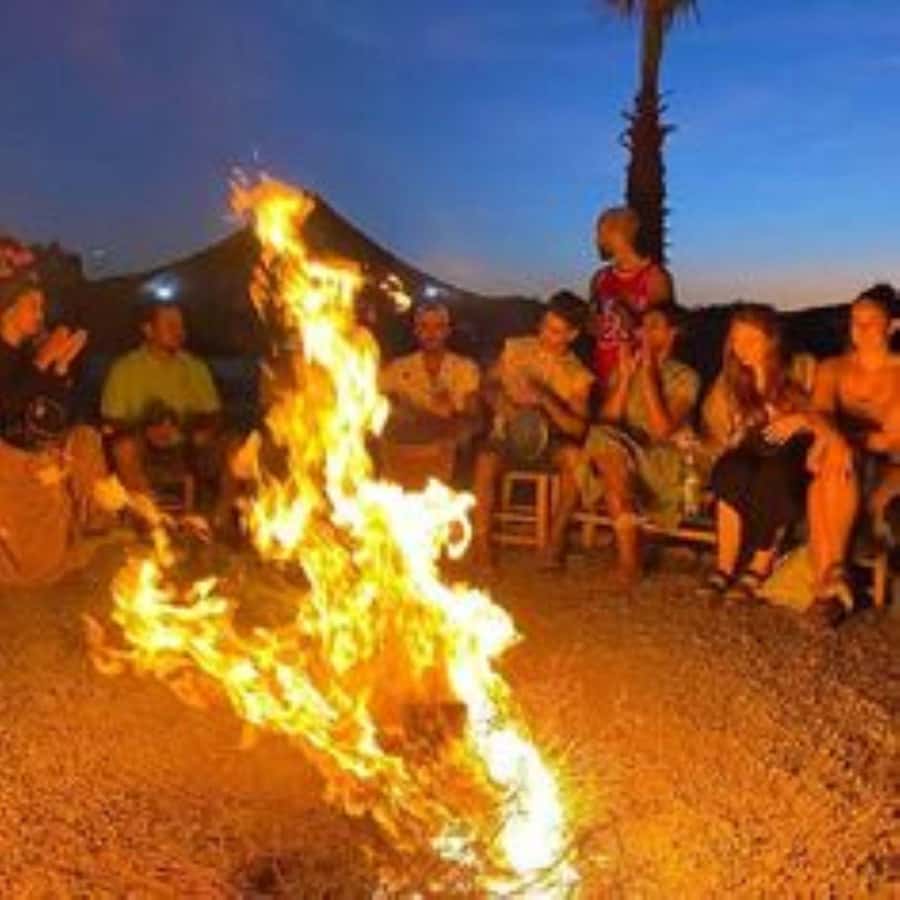 Marrakech: Agafay Desert Magic Sunset Dinner & Live Show - Sunset views, free time, and swimming at the Agafay camp