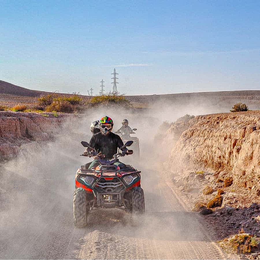 Marrakech: Agafay Desert Quad Biking, Camel Ride Fire Show - Transport to Agafay: Air-Conditioned Comfort Before the Action
