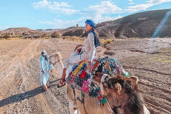 Marrakech: Agafay Desert Quad Biking & Camel Trek & Dinner & Show - Getting Out of Marrakech: Pickup at the Tazi Hotel and the Base Camp Plan