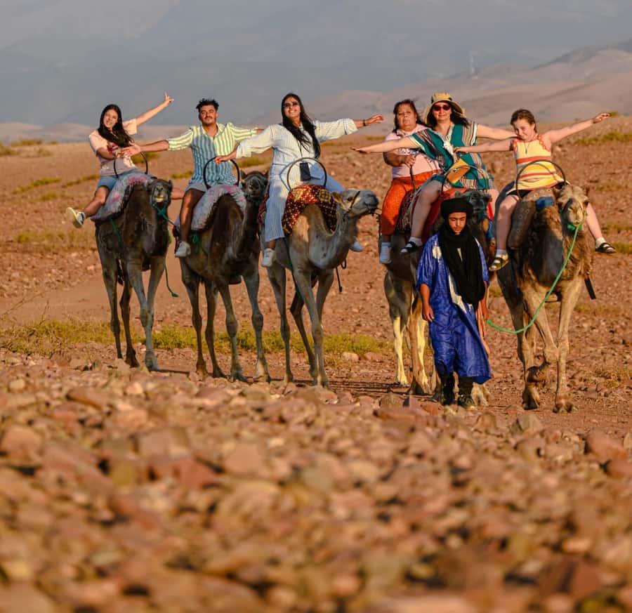 Marrakech: Agafay Desert Quad, Camel Ride & Dinner Show - Quad biking in Agafay: safety first, then speed on rocky tracks