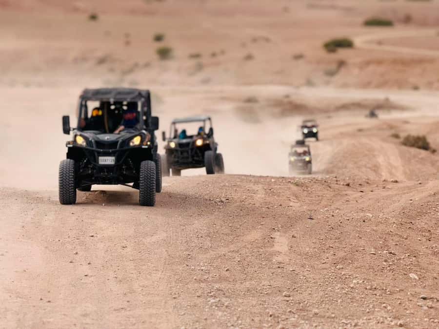 Marrakech: Agafay Dinner Show, Camel Ride, Quad, or Buggy - From hotel pickup to a quick safety briefing