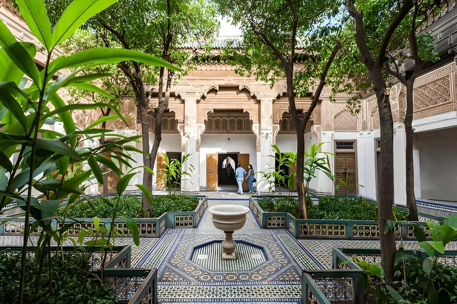 Marrakech: Bahia Palace, Ben Youssef Medersa, & Souks Tour - Mellah photo stop: short look, big neighborhood meaning