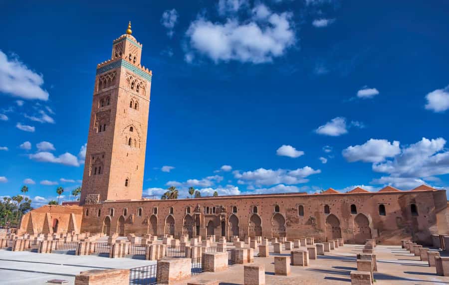 Marrakech: Bahia Palace, Madrasa Ben Youssef & Secret Garden - Mellah Photo Stop: Quick Context in a Neighborhood You’ll Pass Again