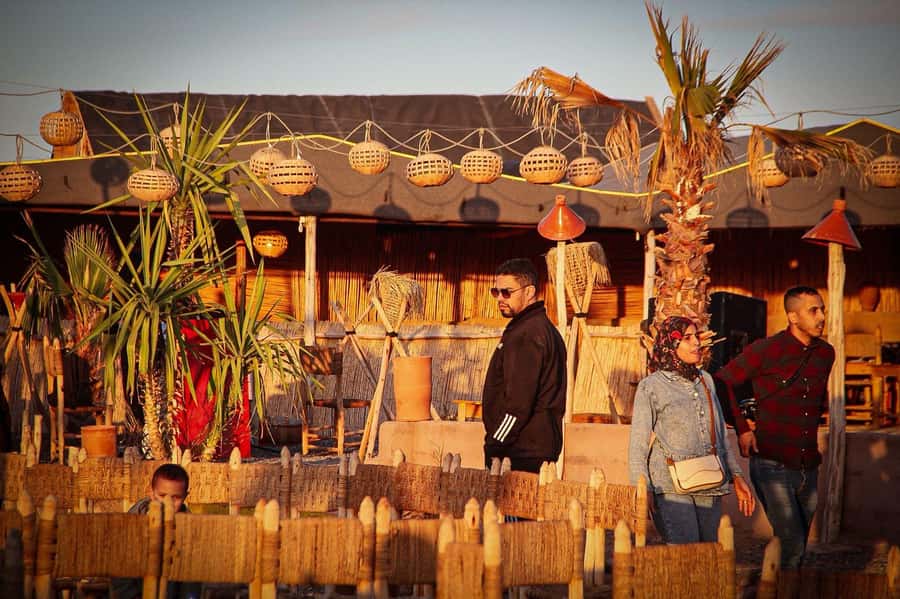 Marrakech: Camel Ride, Dinner, Pool, and Fire Show in Agafay - Welcome Tea and Lantern Light at the Desert Camp