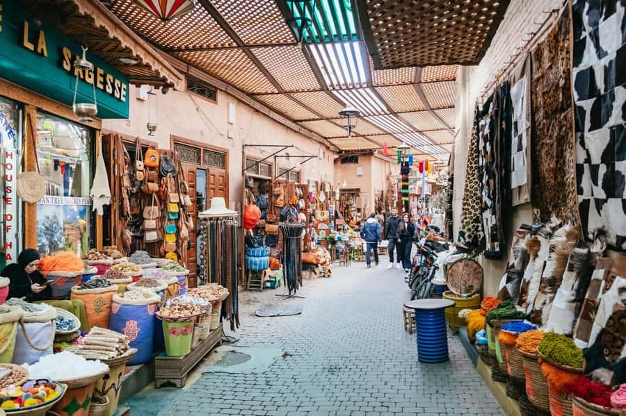 Marrakech: Colorful Medina Souks Guided Walking Tour - Where it all starts: Café de France to Jemaa el-Fnaa in 20 minutes