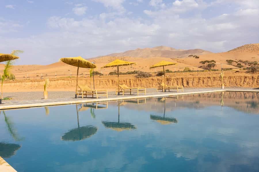 Marrakech: Day Pass in The Desert, swimming pool and lunch - Optional camel riding and camp activities: fun, but decide thoughtfully
