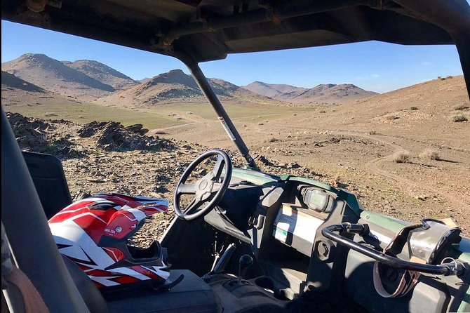 Marrakech Desert Buggy Tour Including Berber Tea Break and transfer - Riding the Agafay Desert: Dry Riverbeds, Palm Groves, and Volcanic Terrain