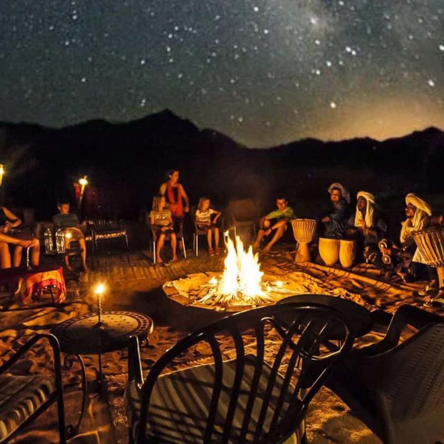 Marrakech: Desert Tour with Dinner, Show and Camel Ride - Dinner under the stars, with music and a fire show
