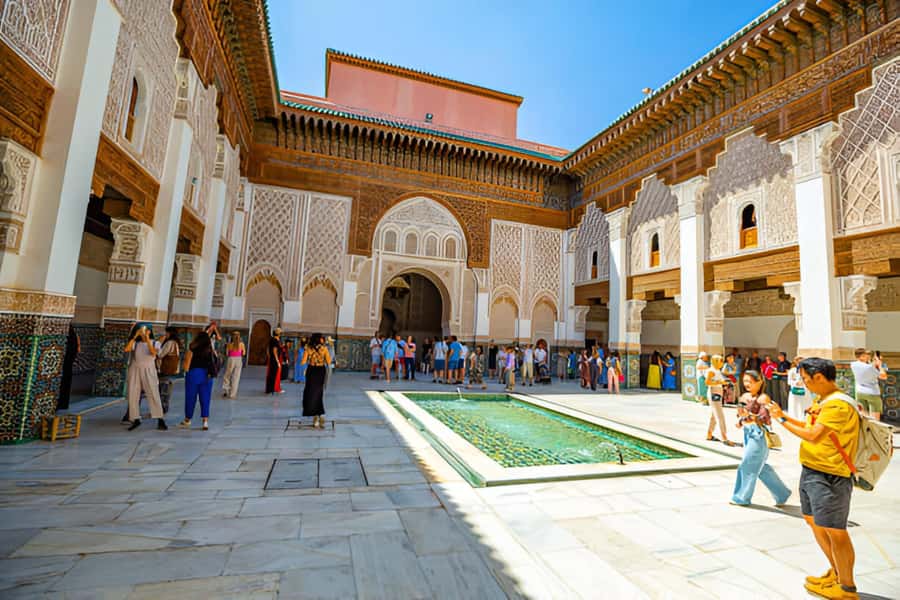 Marrakech: Half-Day Guided Journey through History & Culture - Jemaa el-Fnaa: where Marrakech performs
