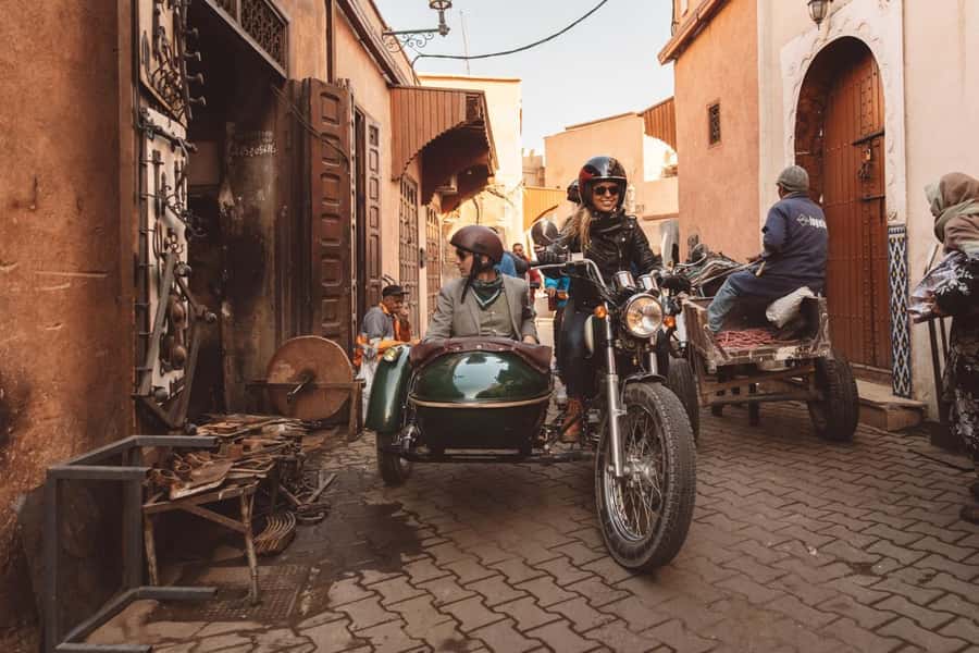 Marrakech Hidden Gems: Vintage 1h30 Sidecar Guided Tour - Palmeraie: palm oasis views, villa gates, and reforestation context