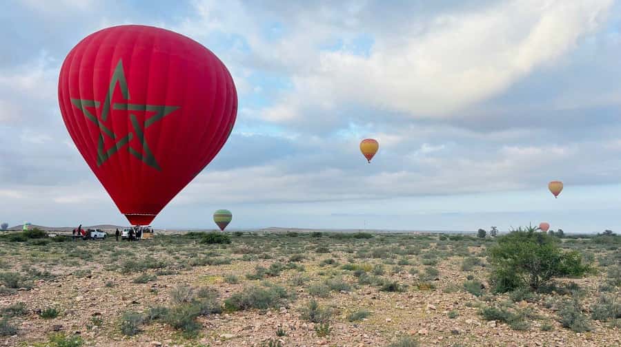 Marrakech: Hot Air Balloon Ride with Breakfast & Transfer - The Atlas Mountains morning: briefing, tea, photo stops, and waiting for weather