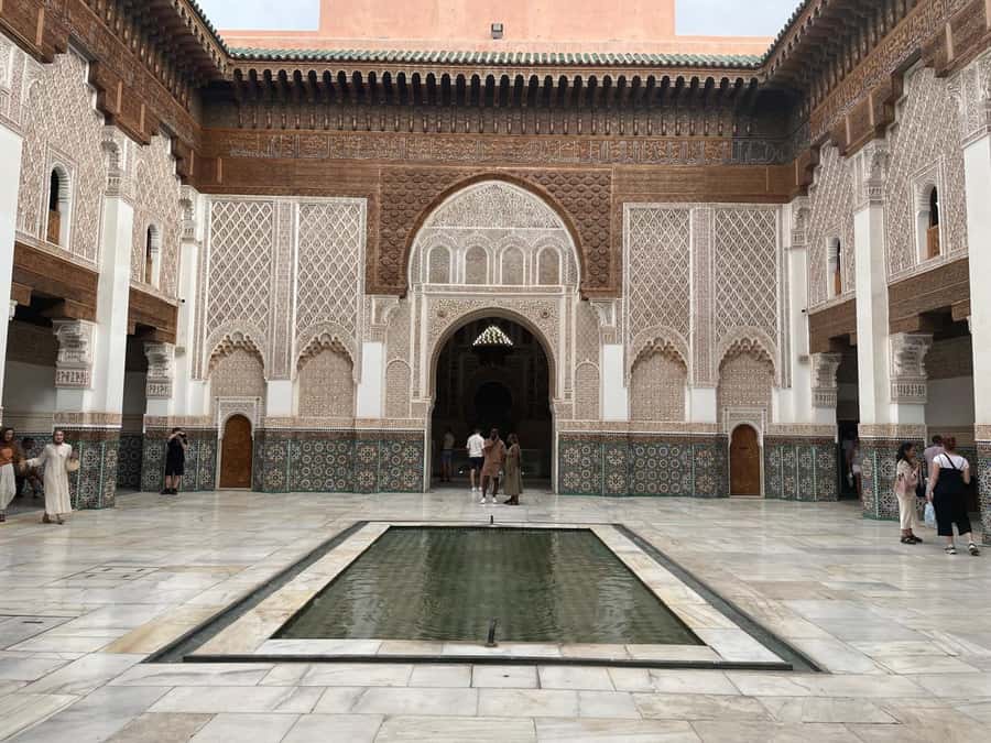 Marrakech: Madrasa Ben Youssef, Secret Garden & Medina Tour - Secret Garden: Symbolic Geometry and a Much-Needed Reset