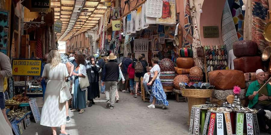 Marrakech: Madrassa Ben Youssef, Secret Garden & Medina Tour - Souk Semmarine, artisan stops, and how the tour keeps you oriented