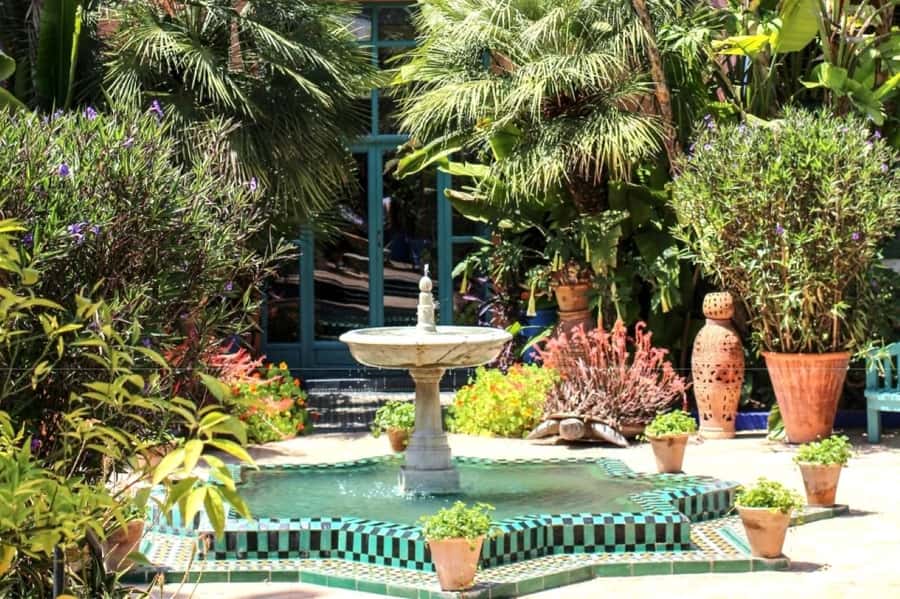 Marrakech: Majorelle Garden, Museums Tickets, & Audio Guide - Majorelle Garden walking route, color, fountains, and design choices