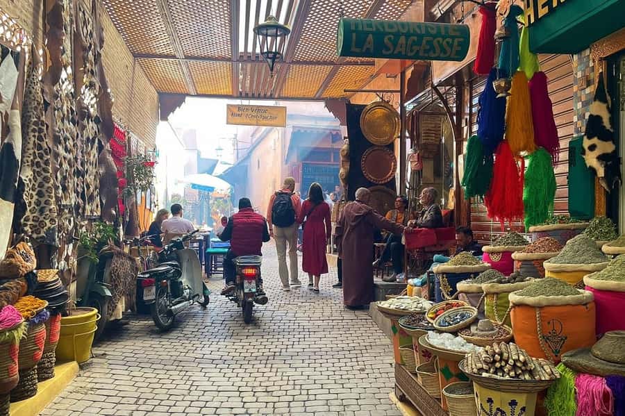 Marrakech: Medina and Souks Walking Tour - Artisans in action at the complex for carpets and rugs