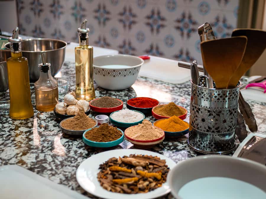 Marrakech: Moroccan Cooking Class with Market Visit and Meal - Back in the Kitchen: Tea, Tools, and Step-by-Step Tajine Skills